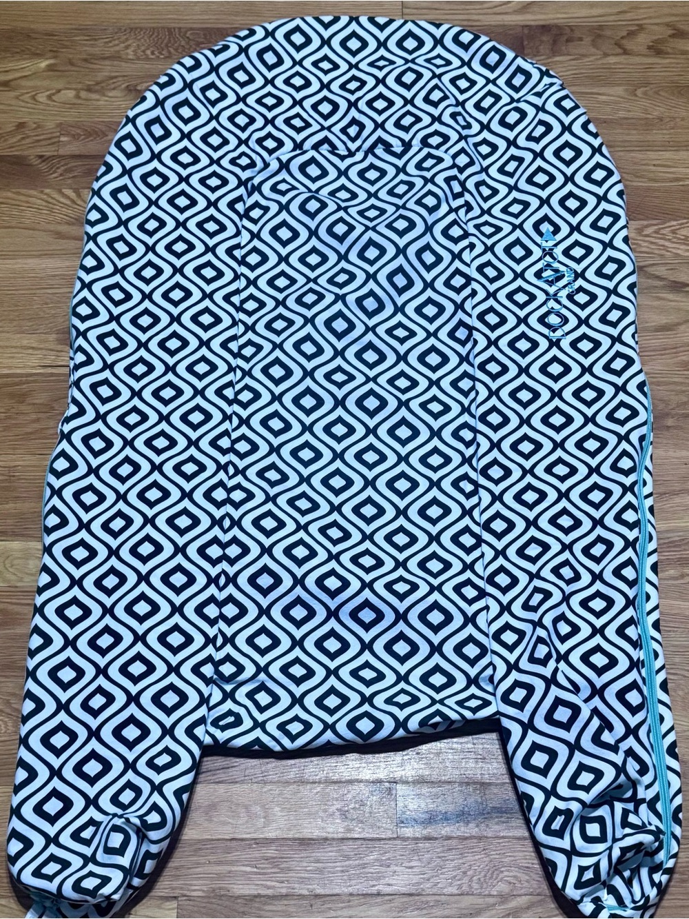 DockATot Grand Black & White Geometric Cover with light green zipper